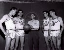 1946-47 Basketball L-R Bryan Lloyd, Danny Lynch, Coach Whitey Baccus, Ben Harris, Burt Rollings