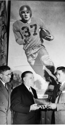 1948 Dr. Ewell Walker Watches Doak Receive The Maxwell Award