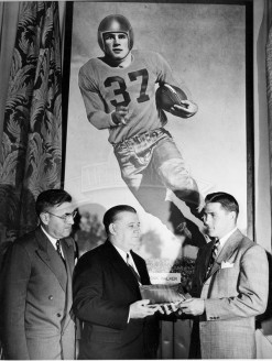 1948 Dr. Ewell Walker Watches Doak Receive The Maxwell Award