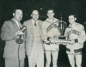 Lank Majors Presents the Winner’s Trophy to Coach Doc Hayes and the Pony Captains, Kastman and Galey