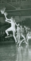 Full House At Joe Perkins Watches Roy Pugh Drive For Layup Against Texas