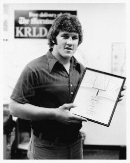 Louie Kelcher with Award
